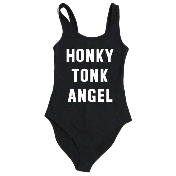 "Honky Tonk Angel Women's Bodysuit" by Vinyl Ranch features white lettering printed on a traditional black bodysuit.
